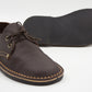 Ladies veldskoen dark brown leather with durable Pyramid black sole showing textured grip pattern
