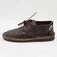 Side view of South African handmade vellie in dark brown leather showing traditional stitching detail