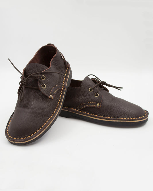 Dark brown ladies velskoen pair showing full-grain leather texture and black sole construction