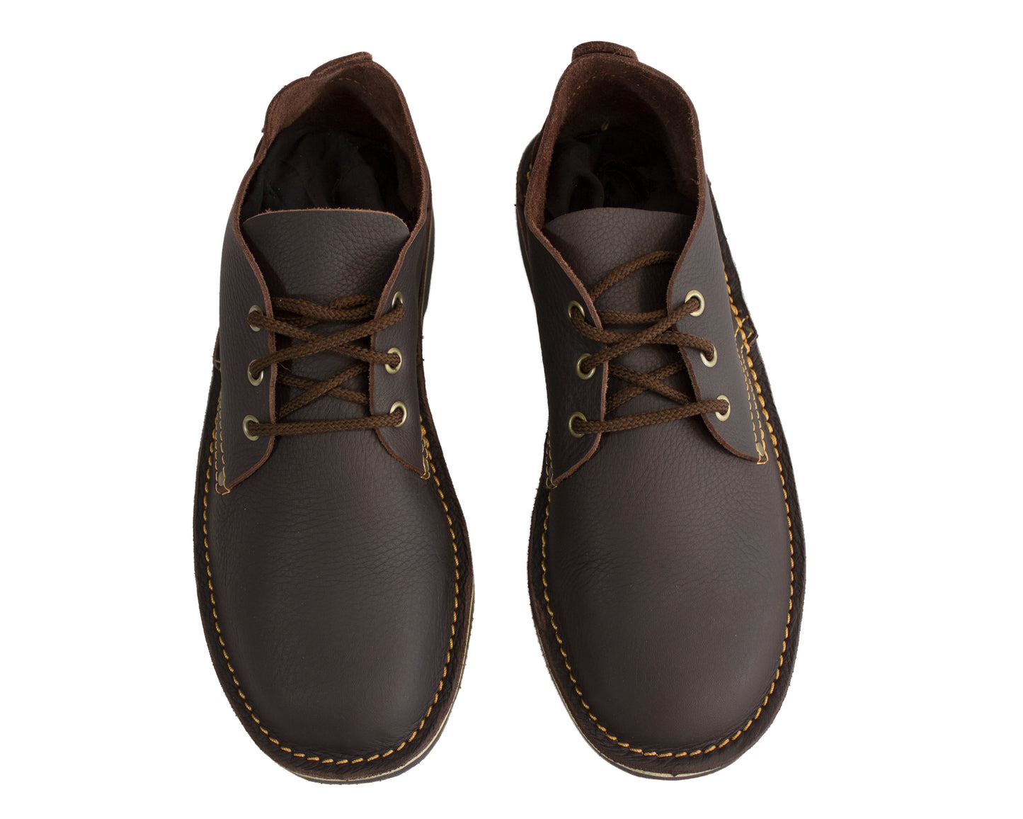 Top view of handmade low-cut veldskoen in dark brown leather showing interior lining and laces