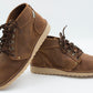 Medium brown Ranger boot pair showing full-grain leather texture and hiking-style lacing with crepe sole
