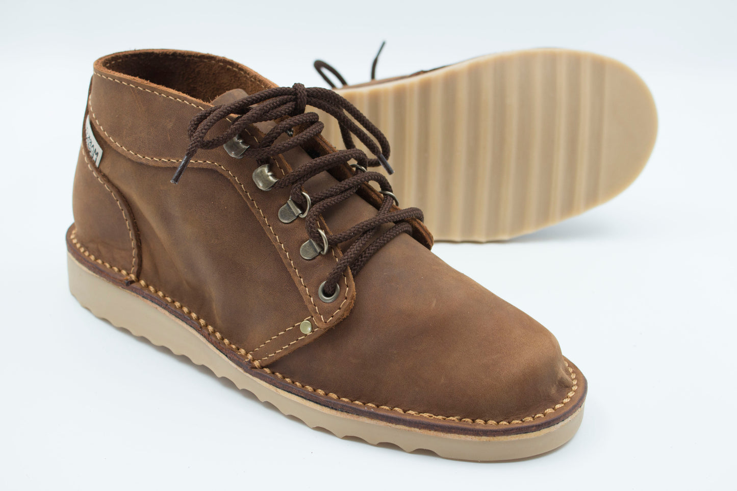 Ranger boot medium brown leather with durable crepe ridged sole showing deep tread pattern