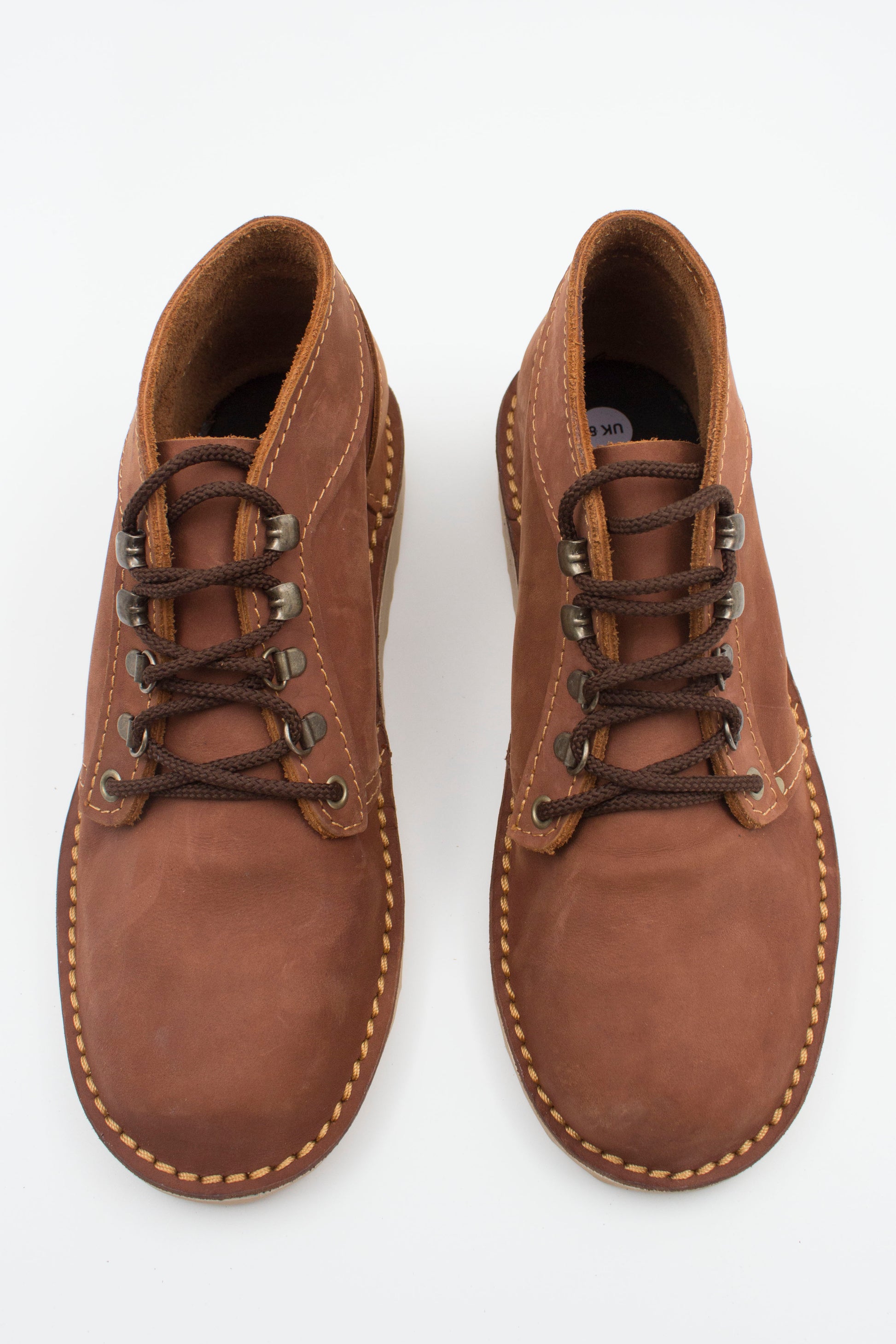 Top view of handmade Ranger boot in tobacco leather showing hiking eyelets and interior lining